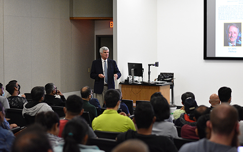 George Pharr presents in front of faculty and students